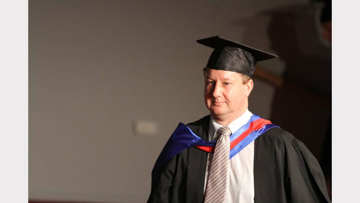 Graduating from Charles Sturt University with a Master of Business Administration (Computing) is Andrew Austen. Picture: Daisy Huntly