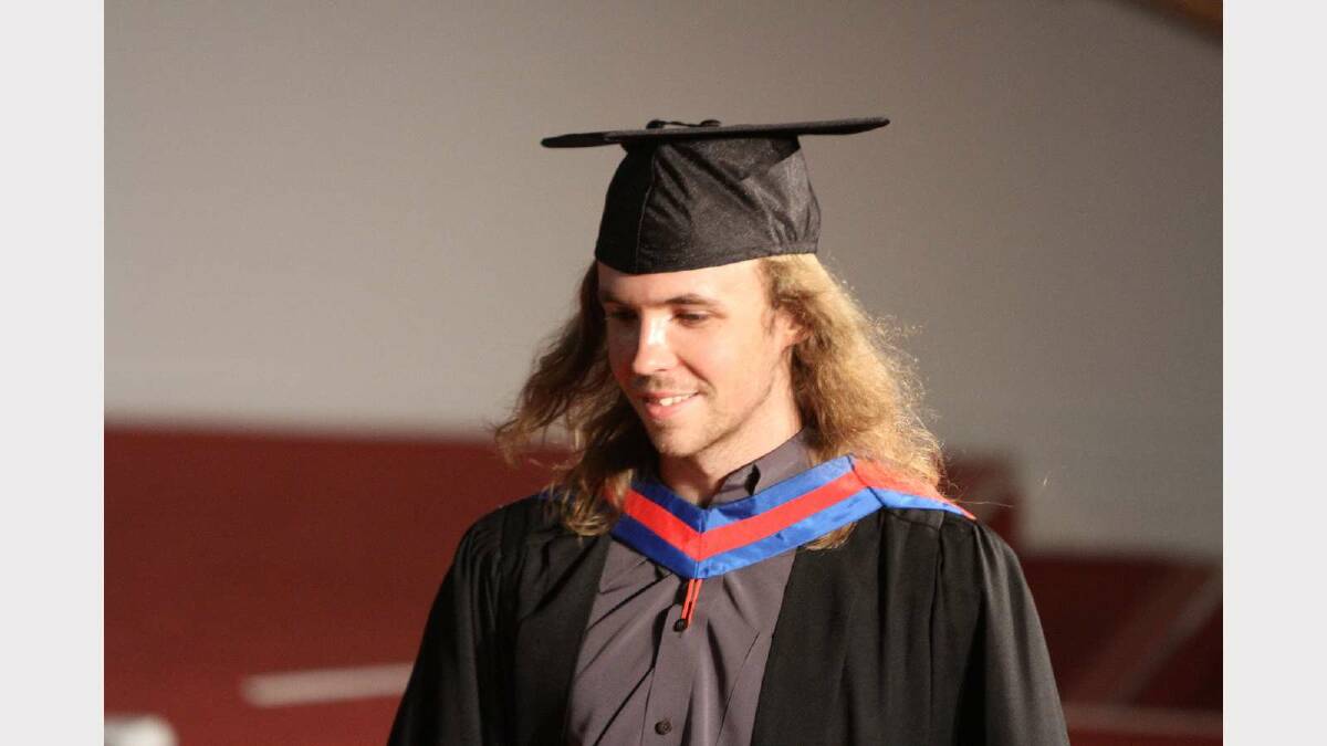 Graduating from Charles Sturt University with a Bachelor of Information Technology is Vincent White. Picture: Daisy Huntly