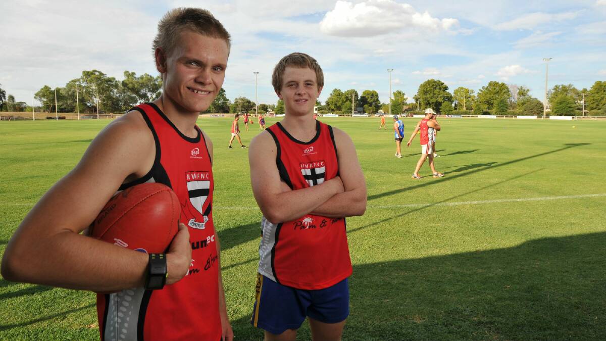 North Wagga recruits Brayden Skeers (left) and Sam Longmore get into the swing of things at training last night at McPherson Oval. Picture: Michael Frogley
