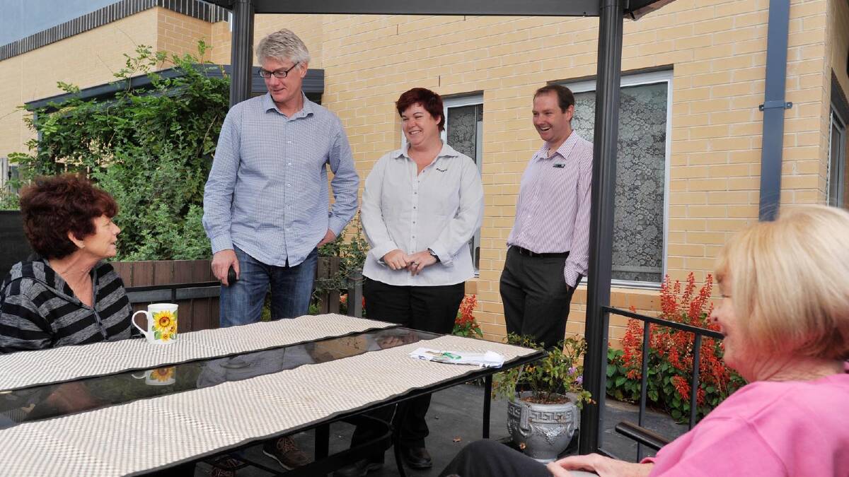 Residents Dianne Murphy and Cheryl Clarke talk to Argyle Community Housing (ACH) representatives (left) Chris Bratchford, Michelle Saffery and Adam Collison. The ACH board was in the city yesterday visiting properties it manages. Picture: Alastair Brook
