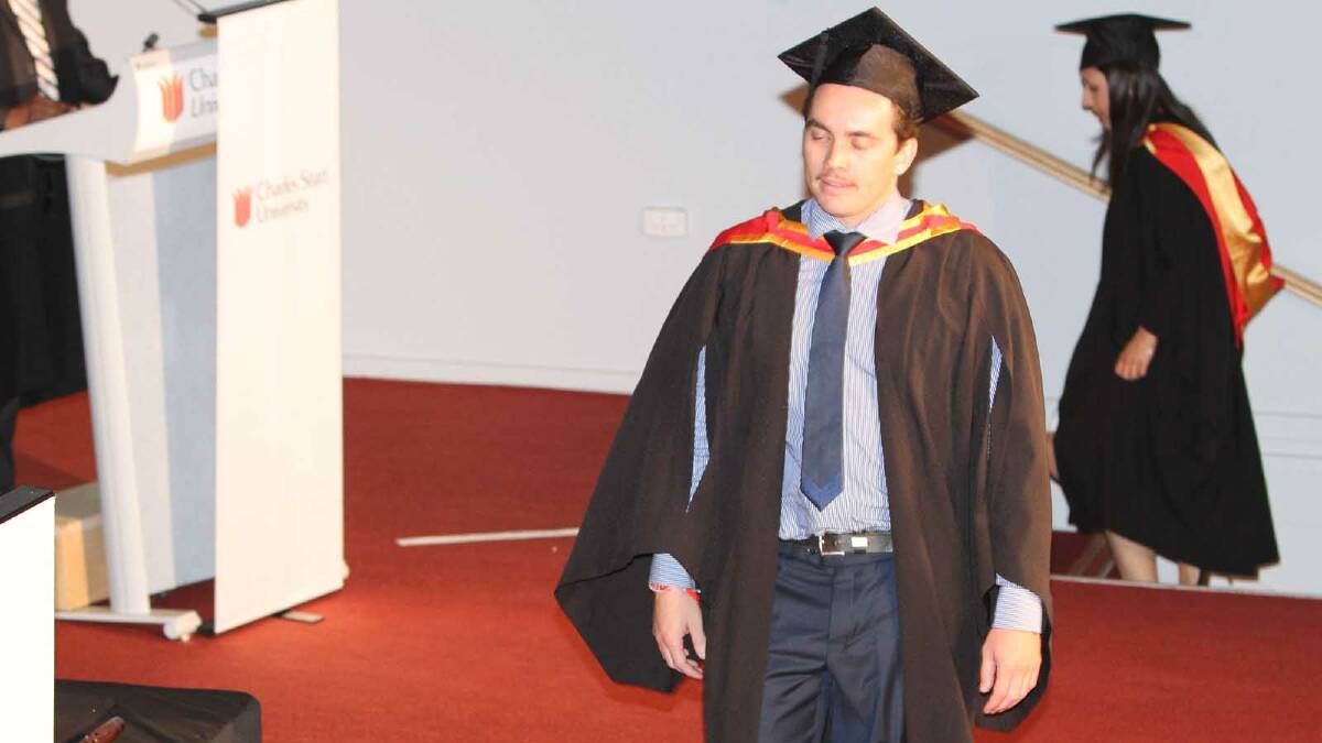Graduating from Charles Sturt University with a Bachelor of Pharmacy is Matthew Tom. Picture: Daisy Huntly
