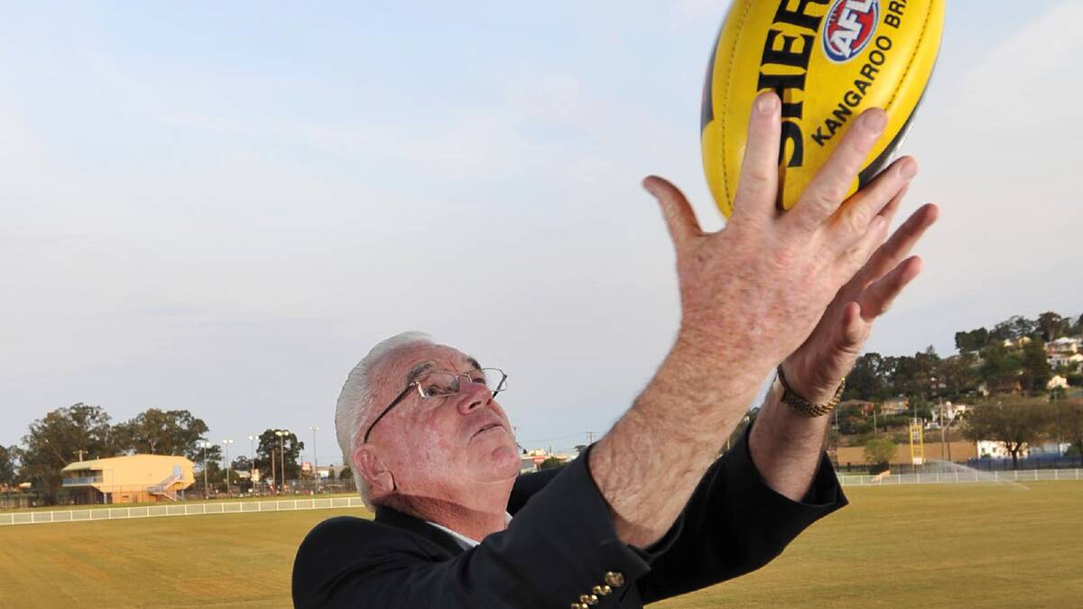 SCREAMER: Wagga Councillor Kerry Pascoe takes a mark at Robertson Oval to celebrate the announcement that Wagga will host a NAB Cup game in March next year. Picture: Michael Frogley