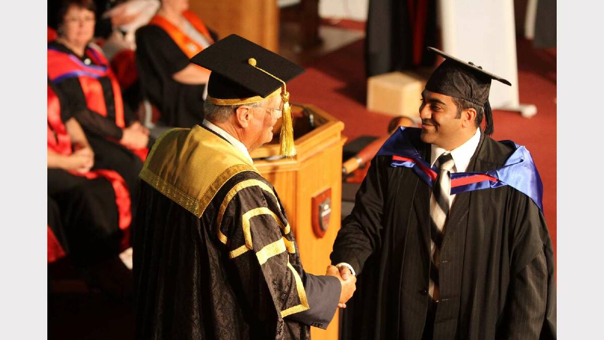 Graduating from Charles Sturt University with a Master of Business Administration is Amit Yadav. Picture: Daisy Huntly