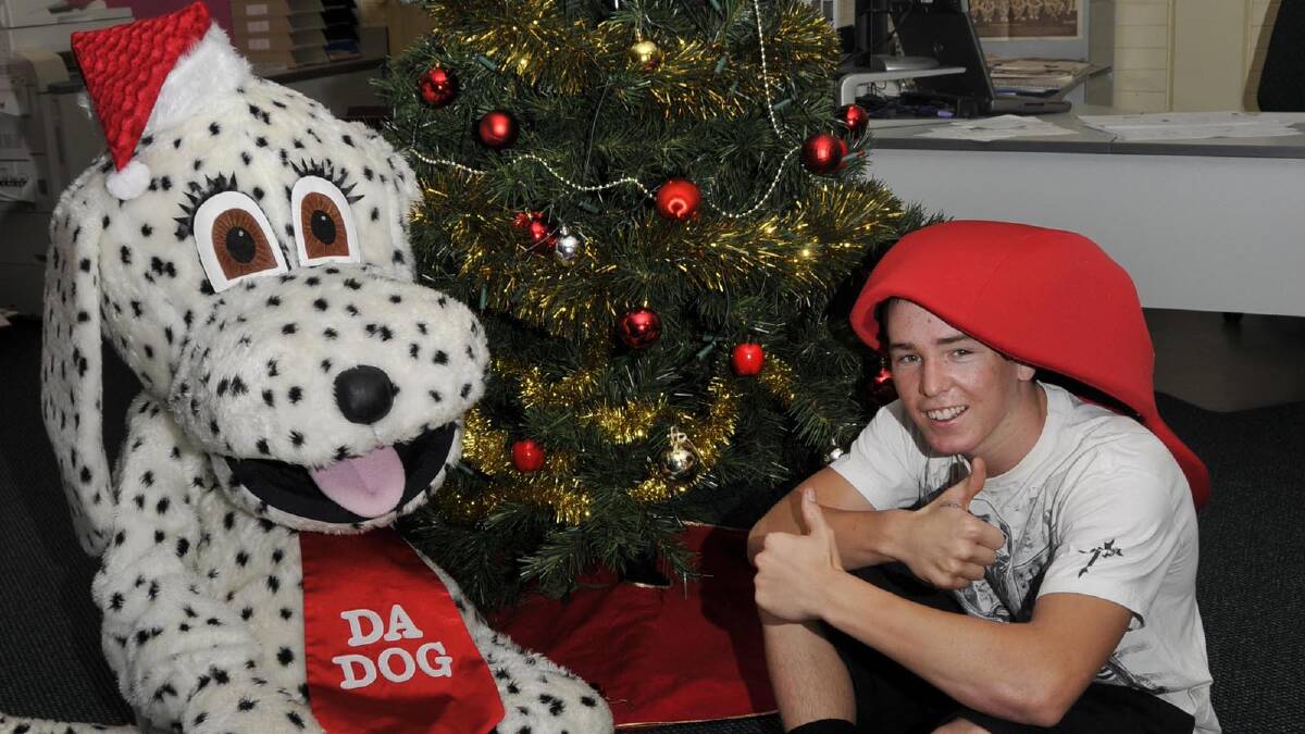 Jackson Strong ... preparing for Christmas with DA Dog in 2008. Picture: Hayley Hillis