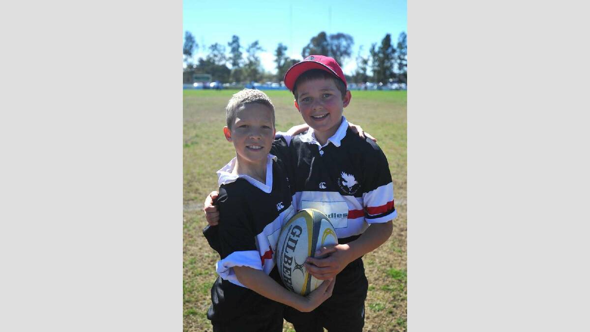 Waratahs were victorious over Wagga City 27-24 in the Walsh and Blair Cup. Charlie Spackman and Cooper Adams, both 11, enoy a day at the rugby. Picture: Addison Hamilton