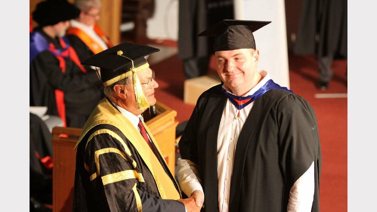 Graduating from Charles Sturt University with a Master of Information Systems Security is Peter Warren. Picture: Daisy Huntly