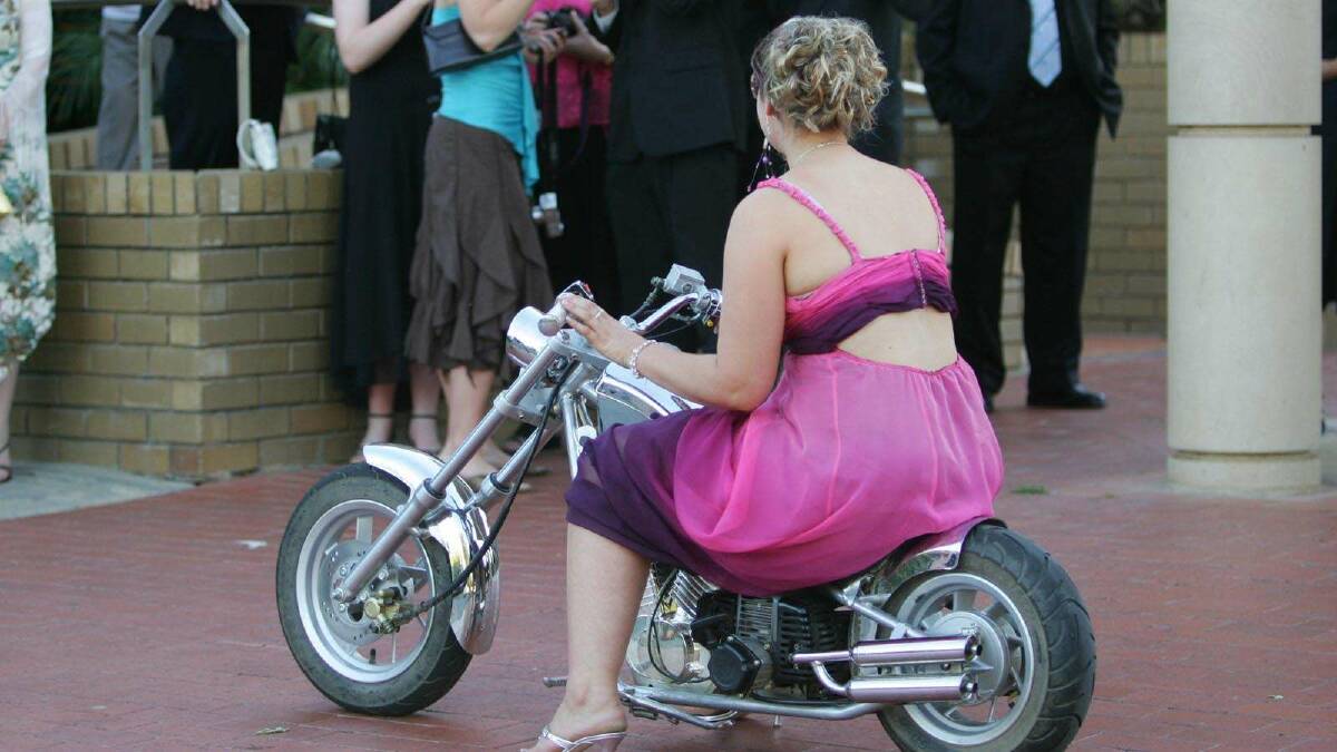Hayley Millerick arrives on a pocket rocket at the Wagga Christian College formal in 2005. Picture: Les Smith