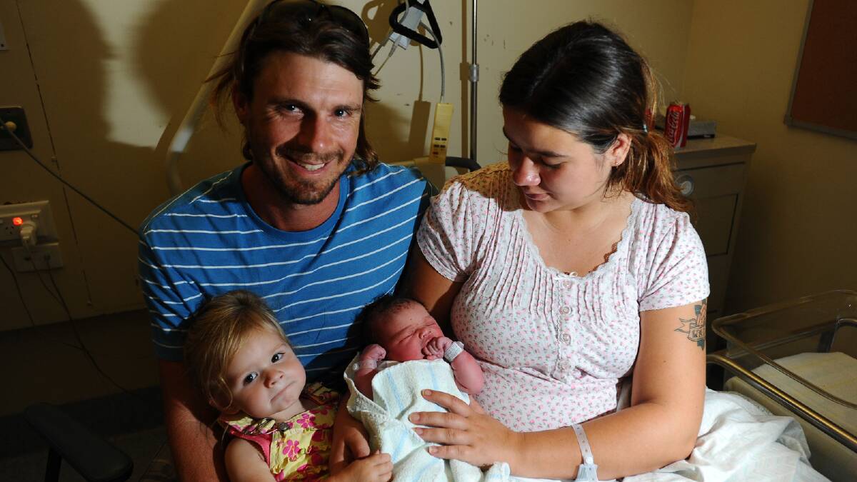 Rori Alice Murphy was the first local baby in 2012 when she was born at 8.31am to parents Wade and Emmalene, from Yerong Creek, on New Year's Day at Wagga Base Hospital. Sister Riley is also pictured with her. Picture: Addison Hamilton