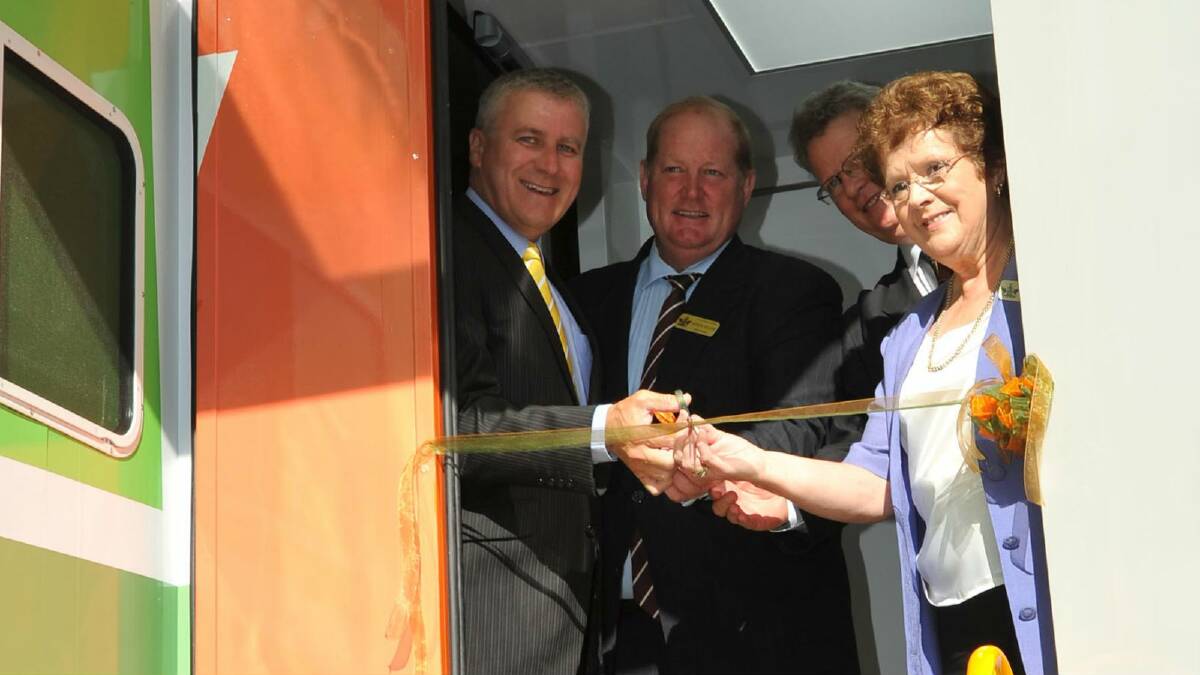 Officially opening the new Riverina Regional Library mobile library are Riverina MP Michael McCormack, councillor Andrew Negline, chief executive of the NSW State Library Alex Byrne and Councillor Yvonne Braid. Picture: Michael Frogley