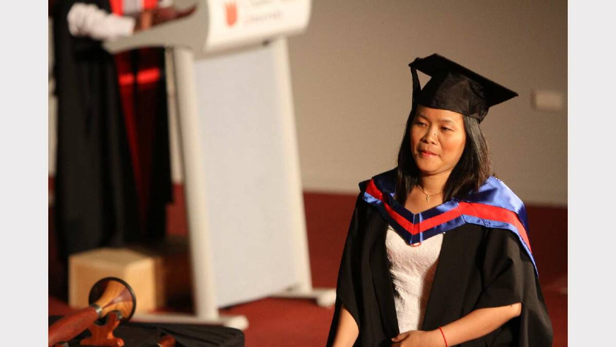 Graduating from Charles Sturt University with a Master of Business is Mao Savin. Picture: Daisy Huntly