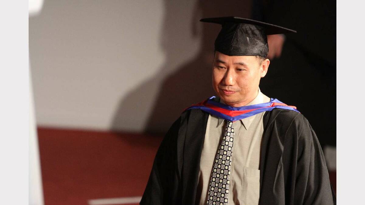 Graduating from Charles Sturt University with a Graduate Certificate in Information Systems Security is Teguh Santoso. Picture: Daisy Huntly