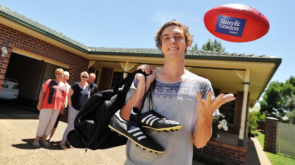 Wagga teenager Max King was getting ready to jump on a plane yesterday after being picked up by AFL club Melbourne in the rookie draft. He was farewelled by his aunty Lyndall Morris, grandmother Marilyn Adams, and parents Megan and Michael King. Picture: Alastair Brook