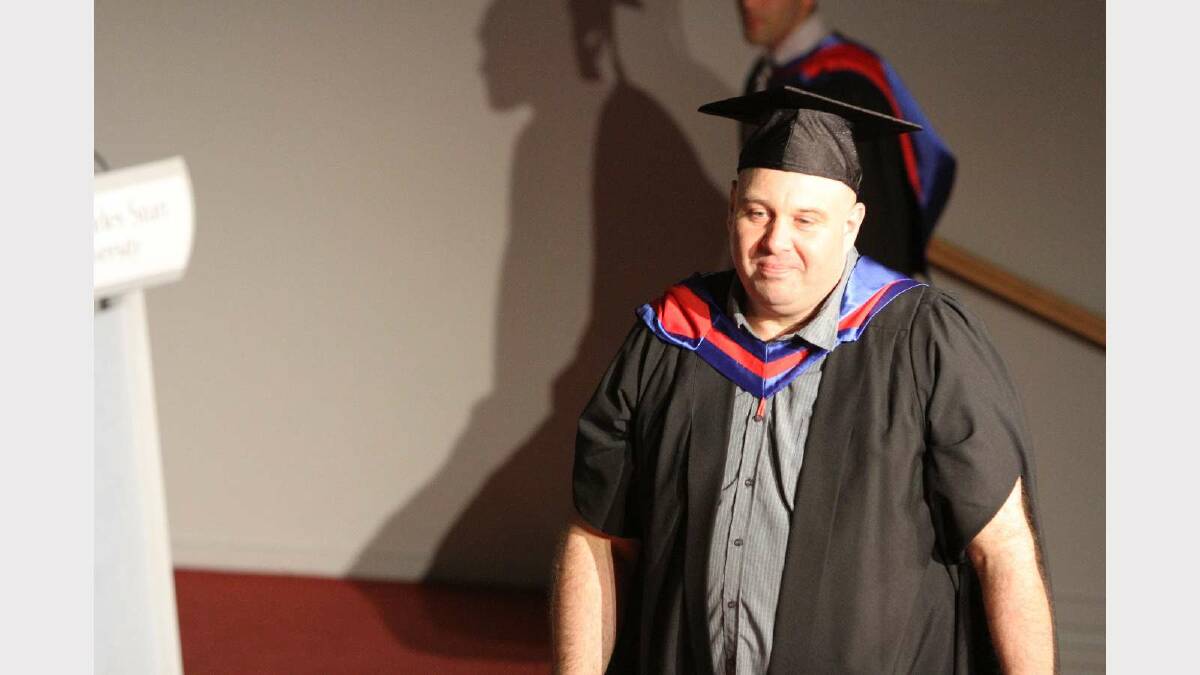 Graduating from Charles Sturt University with a Master of Information Technology is Simon Farrell. Picture: Daisy Huntly