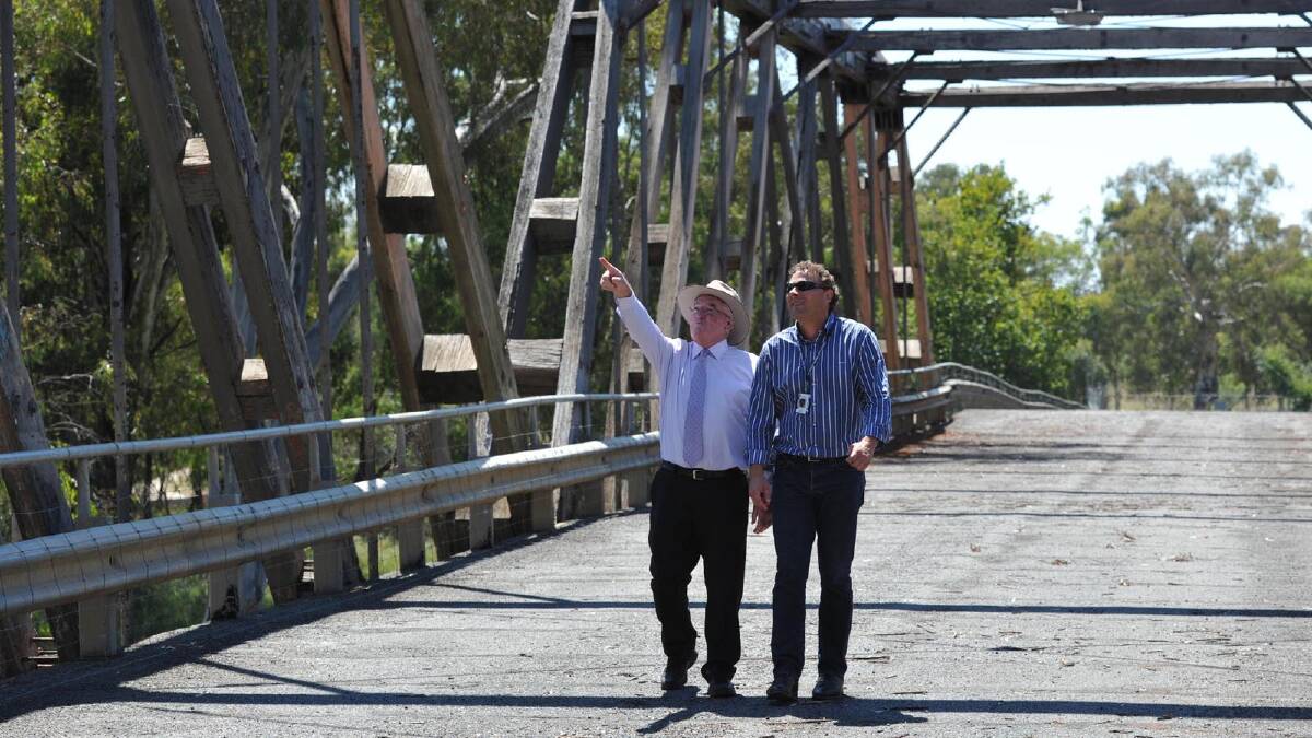Councillor Kerry Pasco and council's director of infrastructure services, Heinz Kausche, look over Hampden Bridge. Picture: Les Smith