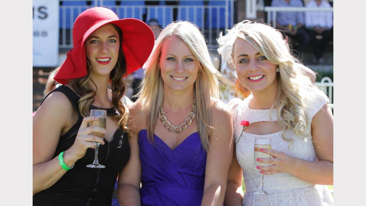 Smiles all round at the MTC Melbourne Cup race day. Picture: Les Smith
