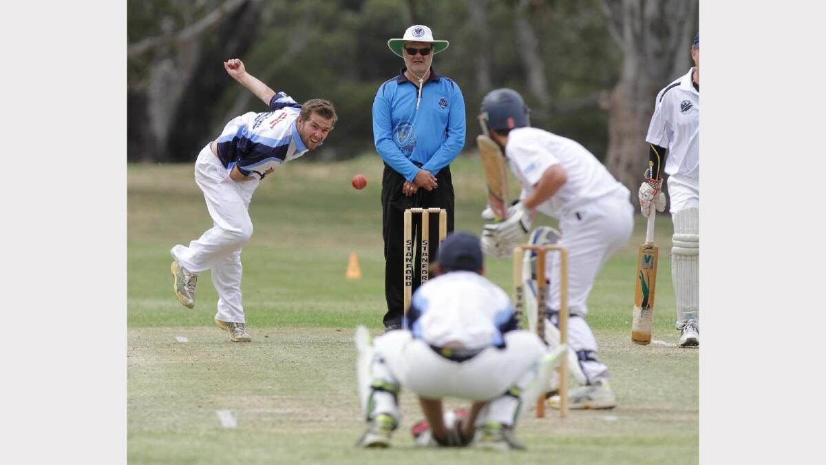 CRICKET: St Michaels v South Wagga at Rawlings Park. Umpire Brendon Hollis watches closely as South Wagga's Jake Hindmarsh sends a ball down the pitch. Picture: Les Smith