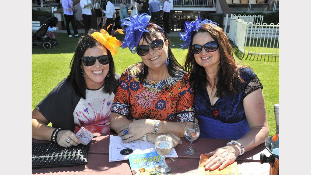 At the MTC Melbourne Cup race day are Dee Collins, Debbie Burns and Libby Byrnes. Picture: Les Smith