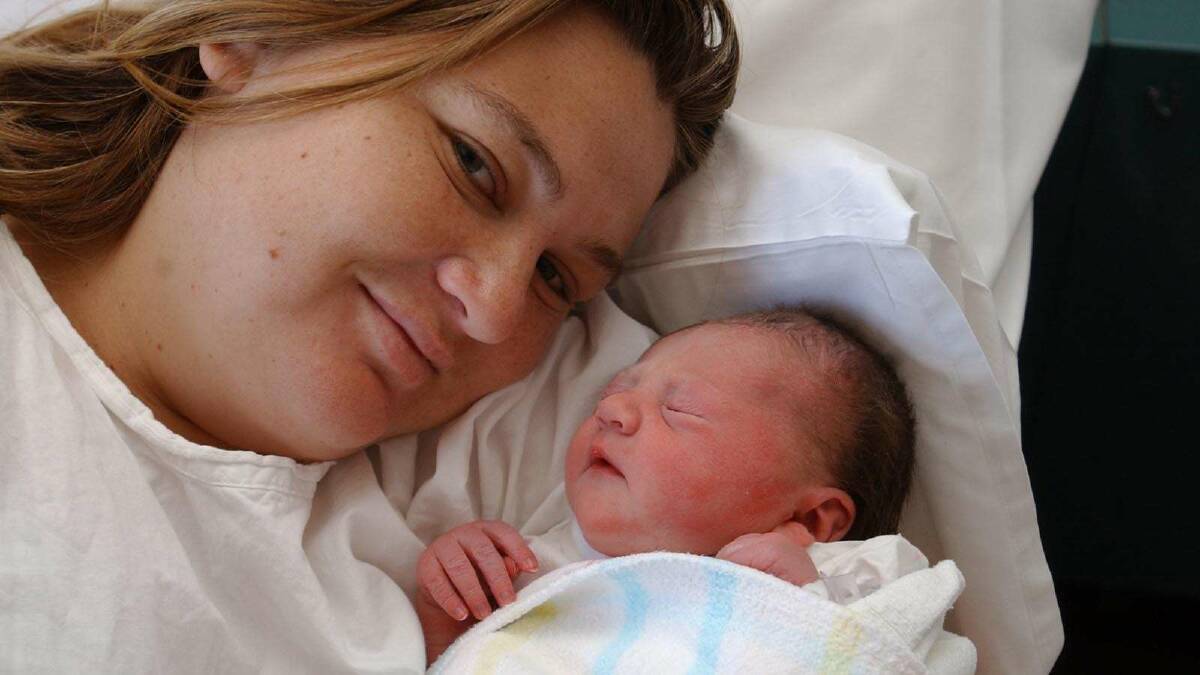 Kayla Anne Land was due on January 19, 2002 when she surprised mum Suzanne Cook and dad Anthony Land, from Wagga, at 3.15am on New Year's Day. Picture: Les Smith