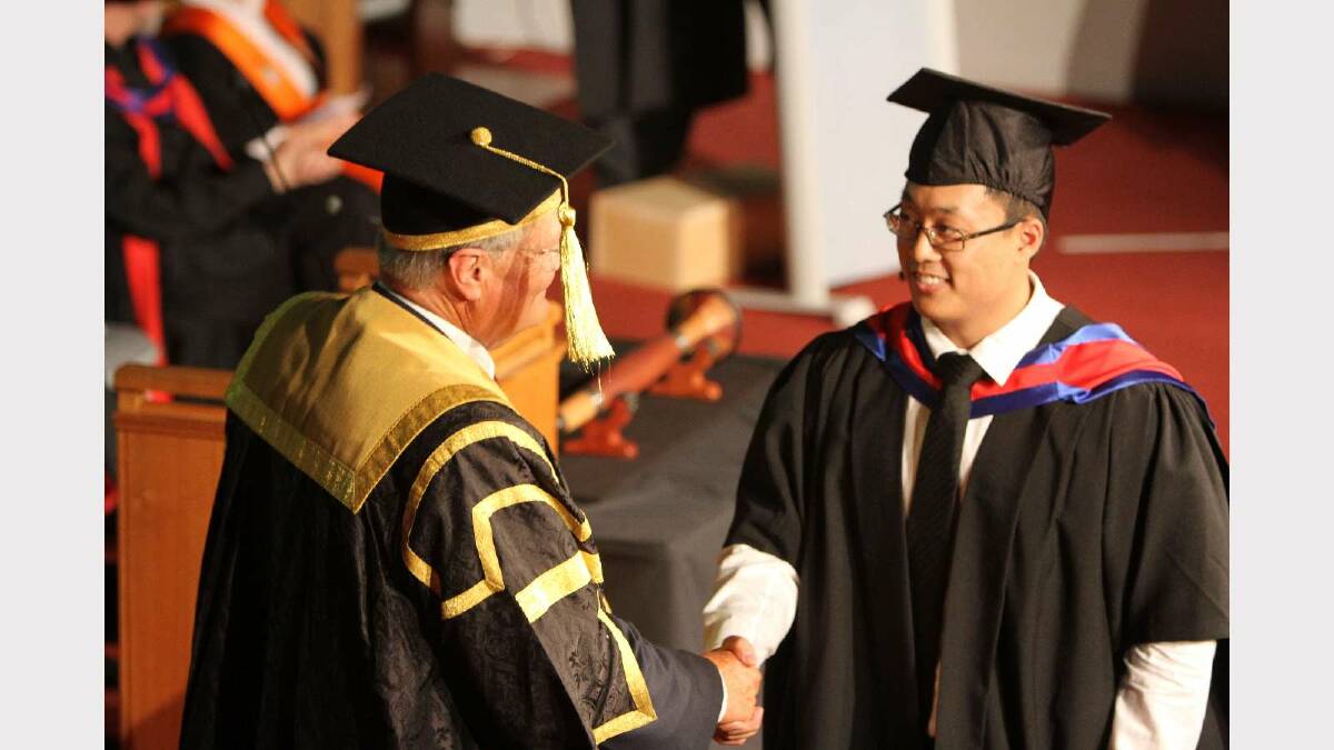 Graduating from Charles Sturt University with a Master of Management (Information Technology) is Le Ha. Picture: Daisy Huntly