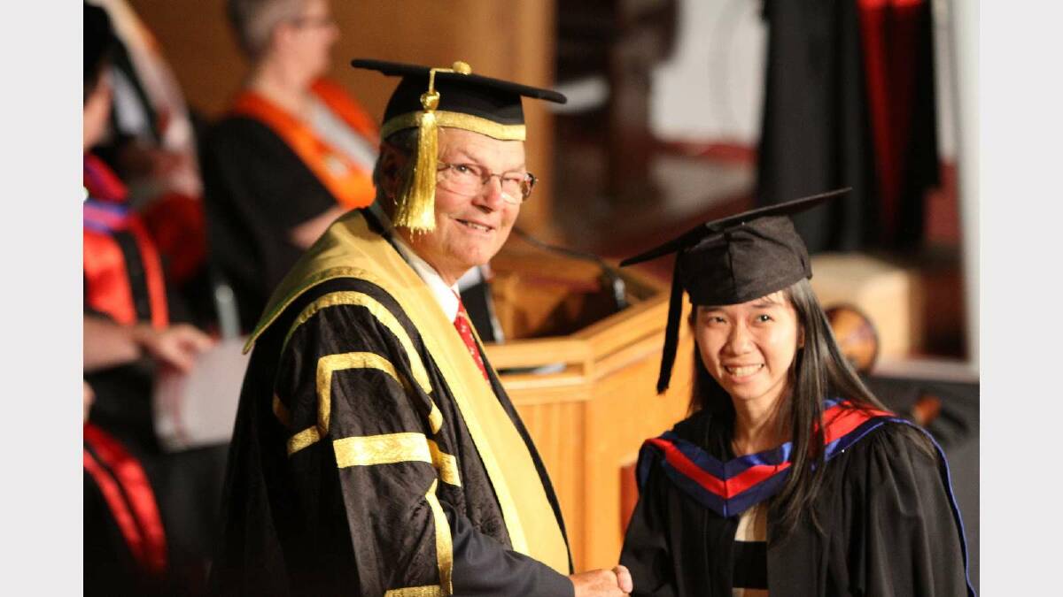 Graduating from Charles Sturt University with a Master of Business is Lim Potheary. Picture: Daisy Huntly