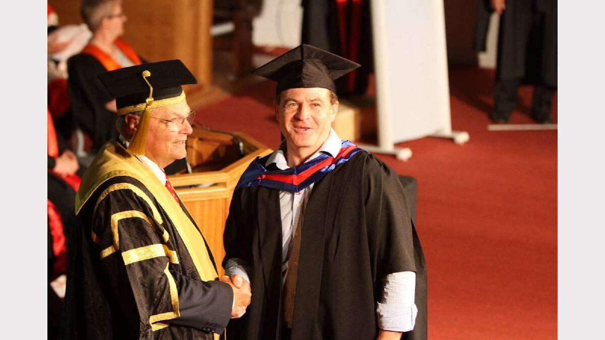 Graduating from Charles Sturt University with a Master of Business Administration is Douglas Stuart. Picture: Daisy Huntly
