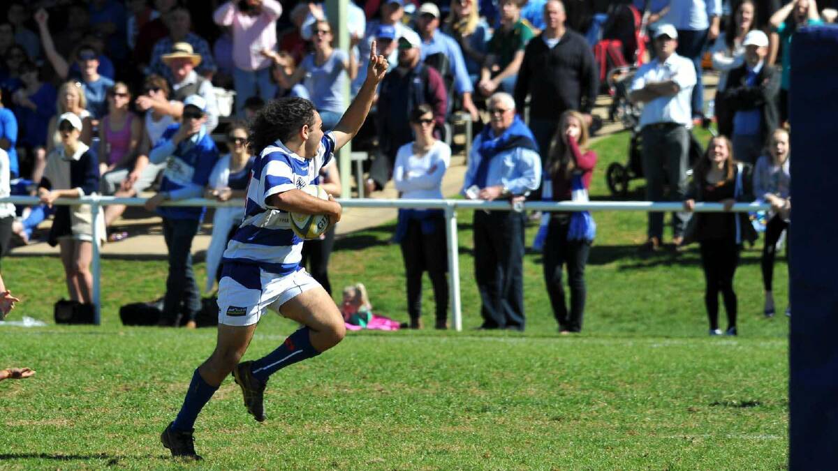 Waratahs were victorious over Wagga City 27-24 in the Walsh and Blair Cup. City's Jya Little scores a try. Picture: Addison Hamilton