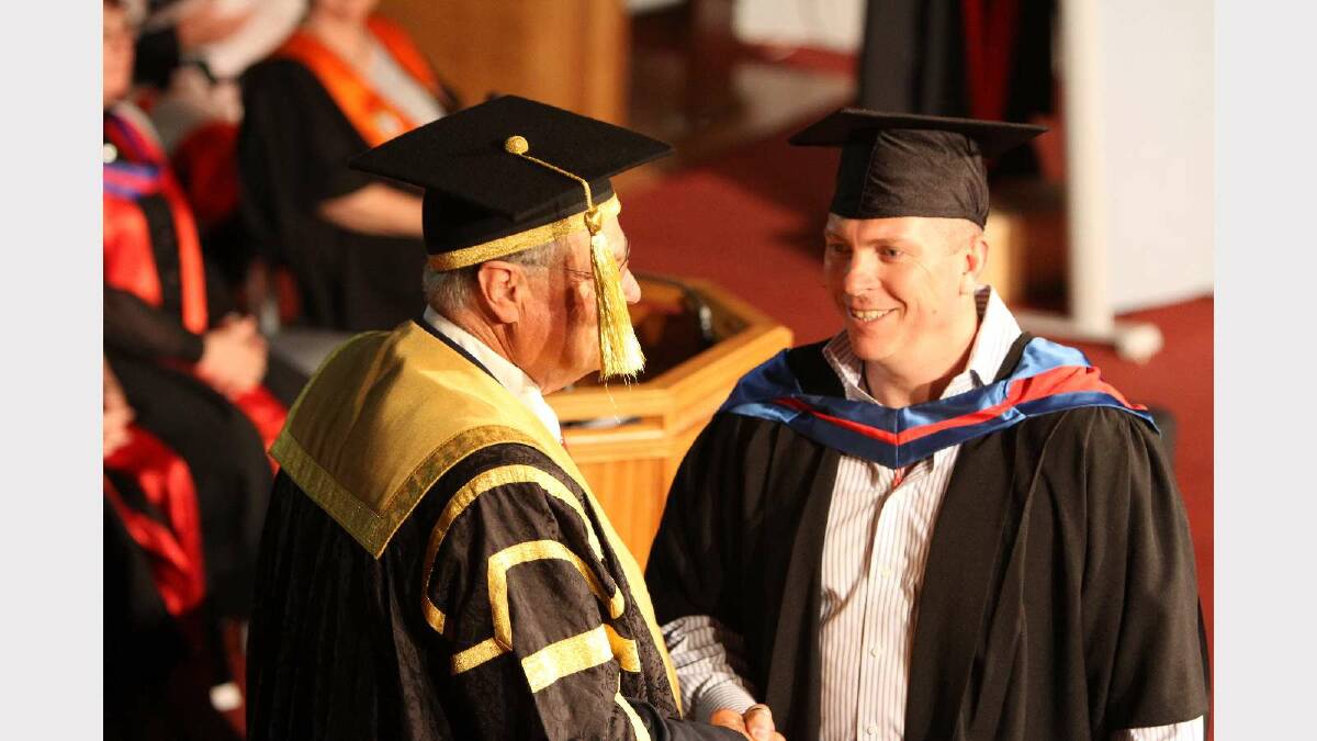 Graduating from Charles Sturt University with a Master of Business Administration is Michael Pinkerton. Picture: Daisy Huntly