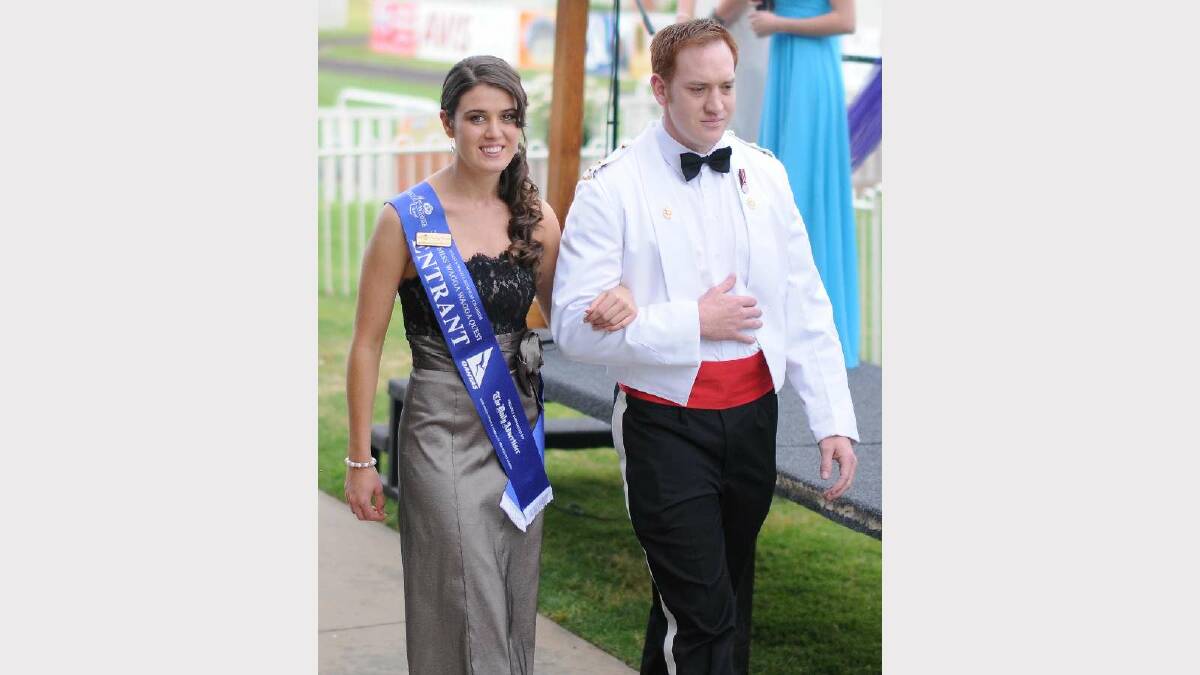 Miss Wagga 2014 crowning ceremony. Kathryn Brooks is escorted by Lt Regan Secco. Picture: Jacinta Coyne