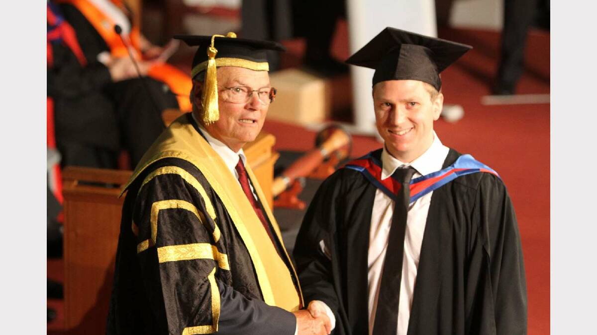 Graduating from Charles Sturt University with a Bachelor of Information Technology is Paul Macheda. Picture: Daisy Huntly