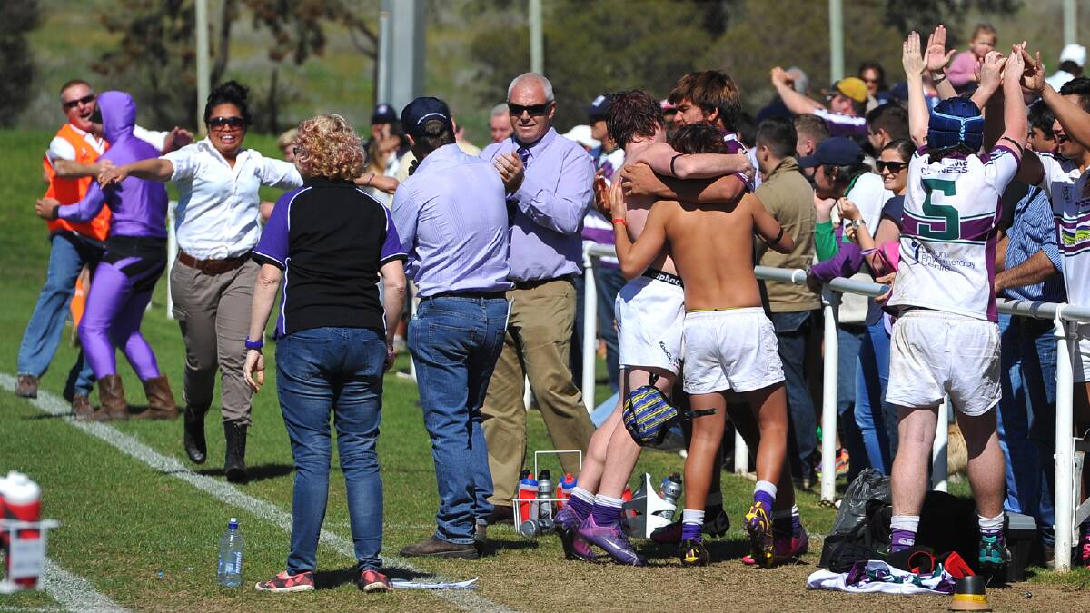 Leeton Phantoms under 17s defeated Waratahs 15-18. Players, supporters and coaching staff celebrate the winning try. Picture: Addison Hamilton