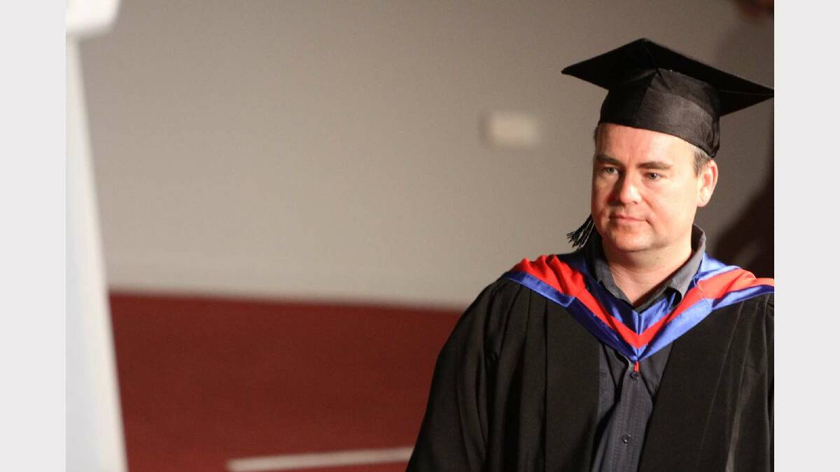 Graduating from Charles Sturt University with a Master of Networking and System Administration is Michael Bullock. Picture: Daisy Huntly