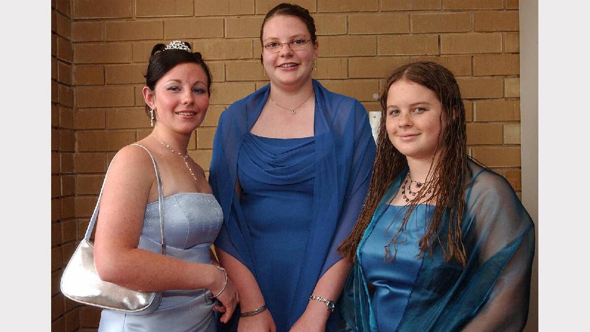 Kimberley Stone, Ann-Marie Velthuis and Danica Moran at the Mount Austin High School Year 10 formal in 2004. Picture: Brett Koschel