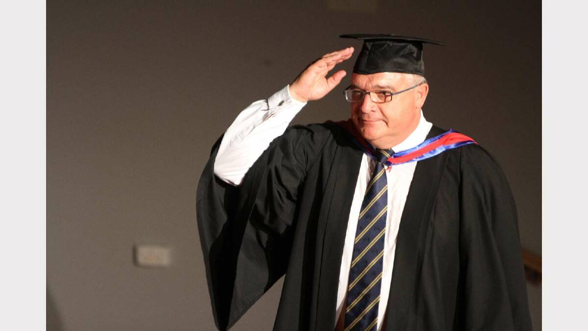Graduating from Charles Sturt University with a Graduate Diploma of Mathematics is Paul Collins. Picture: Daisy Huntly