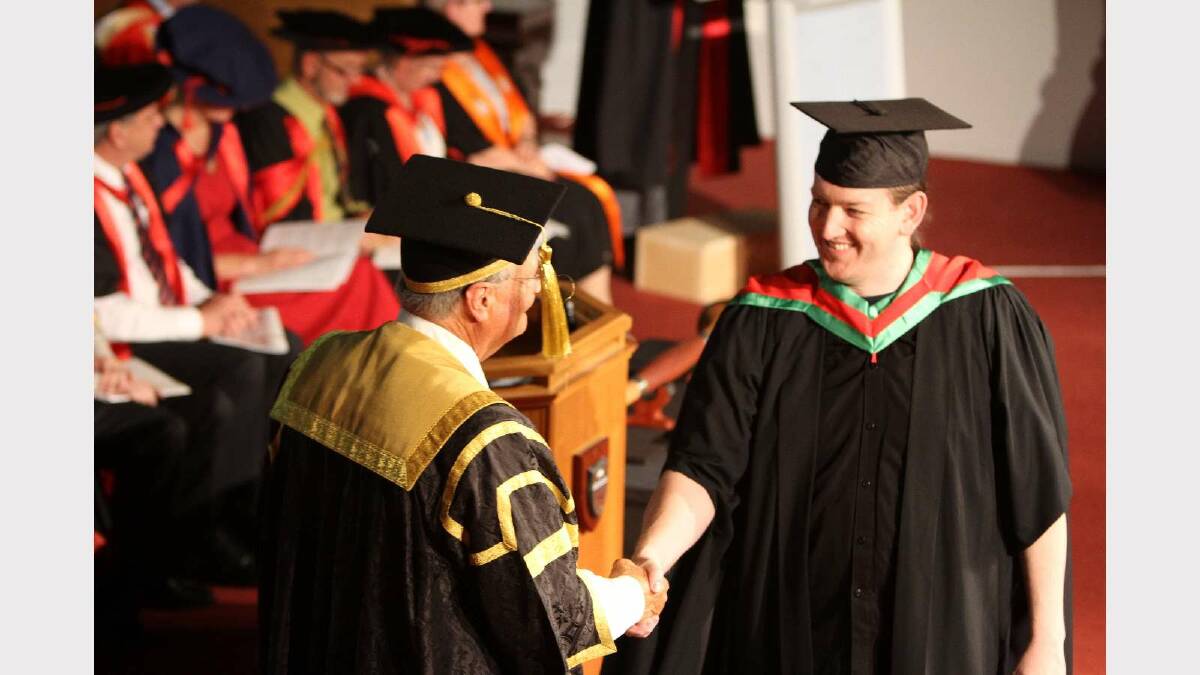 Graduating from Charles Sturt University with a Master of Information Studies is Eric Dodson. Picture: Daisy Huntly