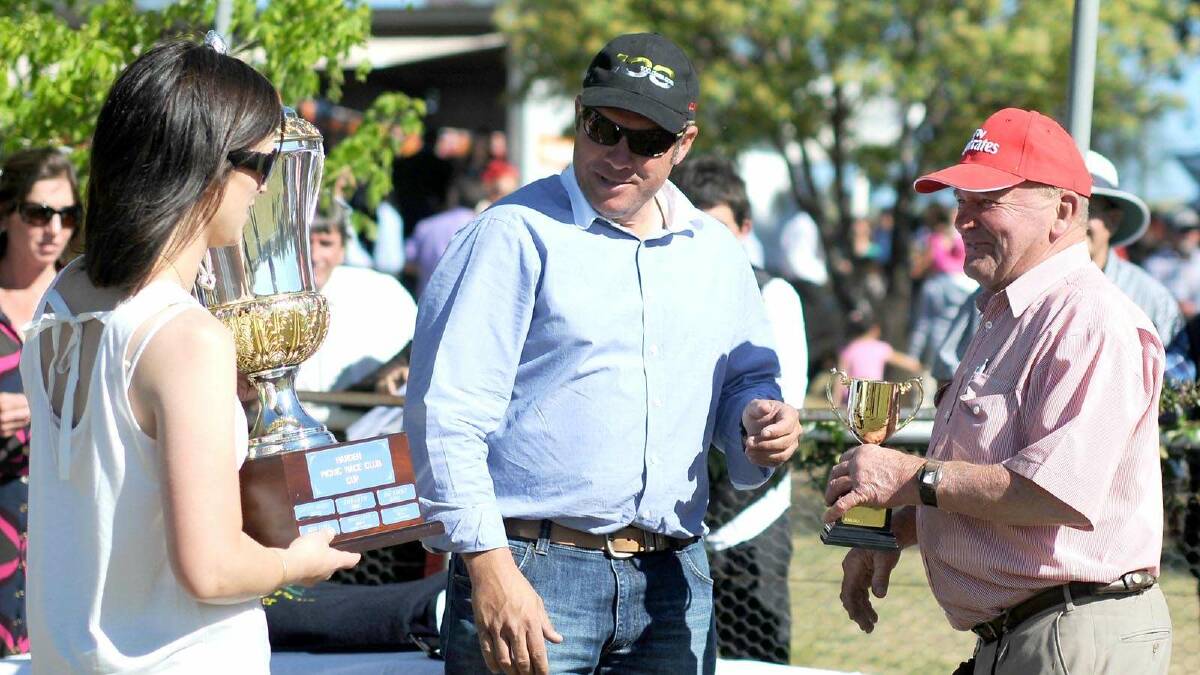  Julia Spackman with Paul Spackman present the Class Harvest Harden Cup to Graeme Spackman. Picture: Jacinta Coyne
