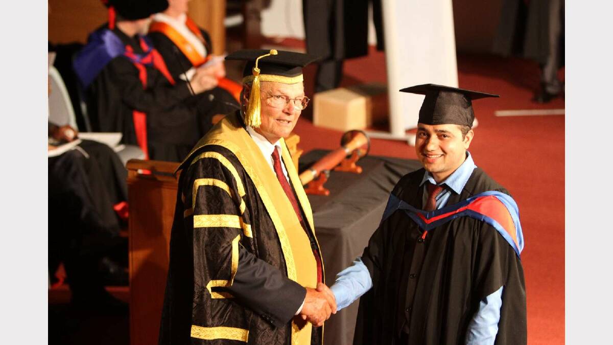 Graduating from Charles Sturt University with a Master of Information Technology is Bishnu Neupane. Picture: Daisy Huntly