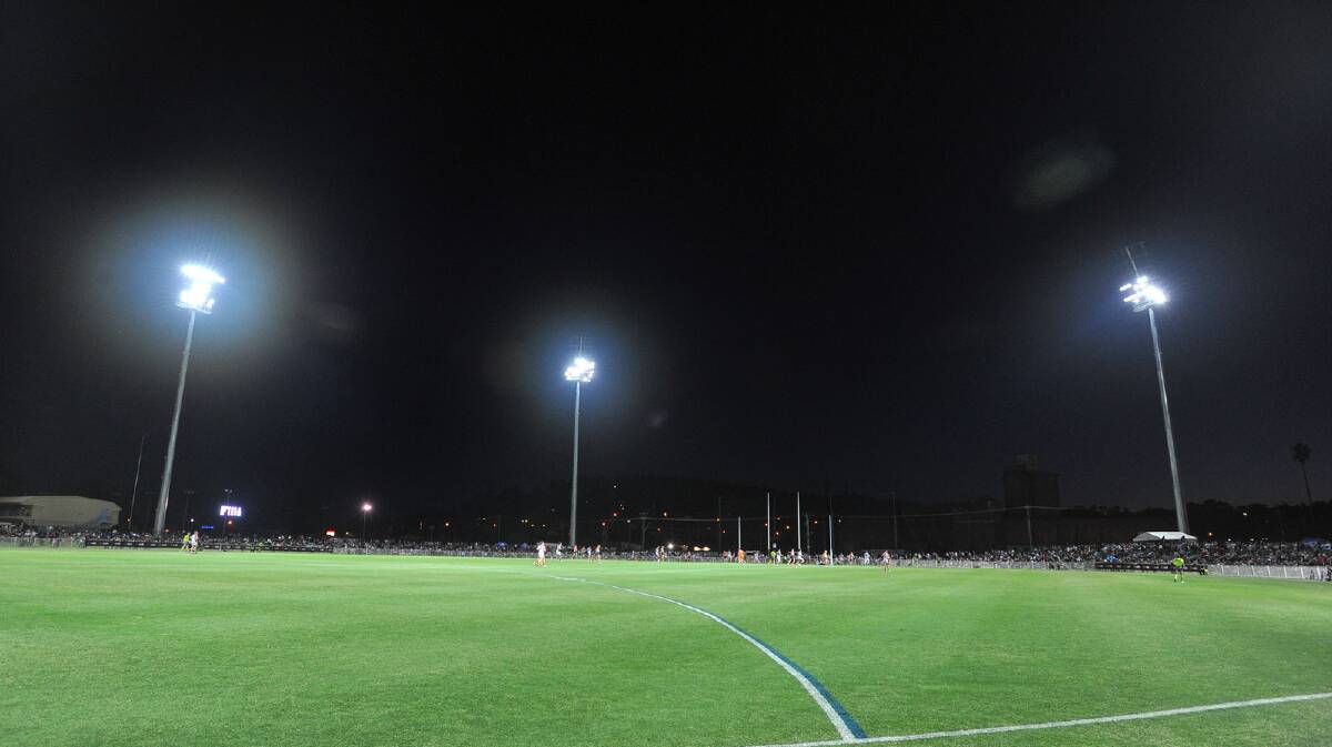 The redeveloped Robertson Oval shines under new lights for the NAB Cup clash between Greater Western Sydney and Brisbane Lions on Saturday