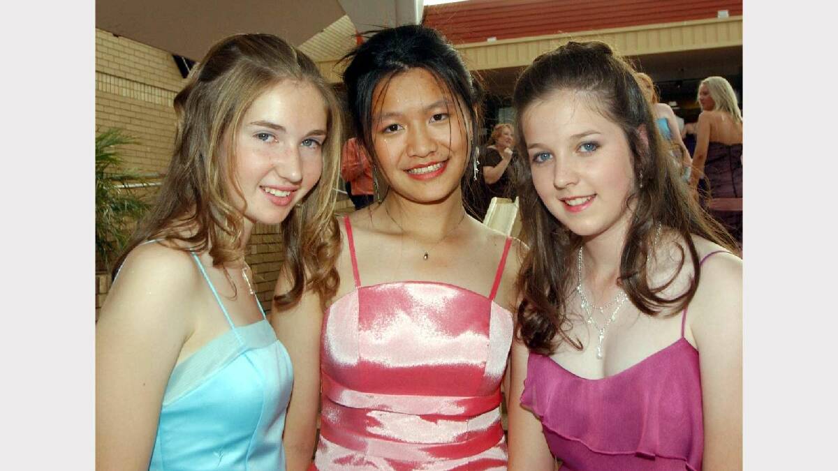 Hannah Wurf, Ashley Chen and Samantha Paton at The Riverina Anglican College (TRAC) Year 10 formal in 2004. Picture: Les Smith