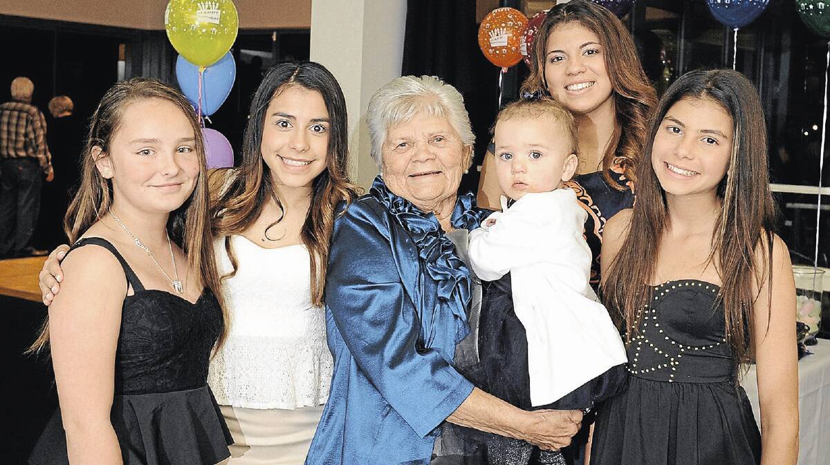 THREE GENERATIONS: Aunty Isabel Reid (centre) celebrated her 80th birthday at the weekend with friends and family including great-grandchild River Reid, 16 months, and grandchildren (from left) Marlie Creighton, 11, Maddison Fisher-Reid 14, Janakah Reid, 15 and Asyah Reid, 12. Picture: Michael Frogley