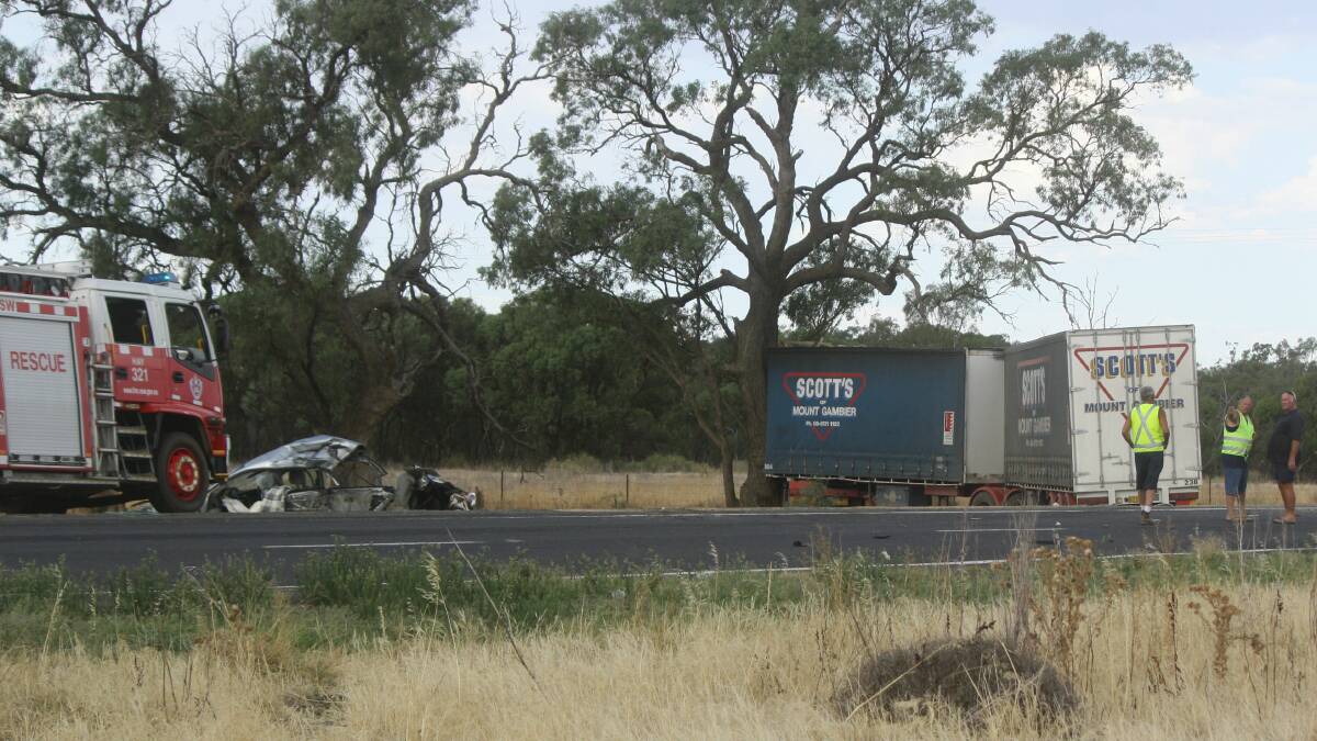 The scene of a fatal crash between a car and truck on the Sturt Highway east of Hay. The accident, which occurred shortly before 5pm on Saturday forced the closure of the highway. Picture: Daisy Huntly