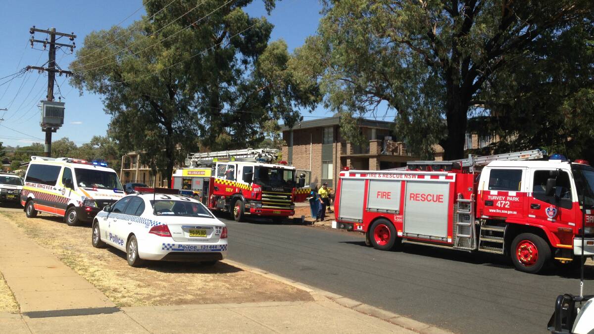 ﻿Emergency services at a unit block in Joyes Place, Tolland, following a fire in an airconditioner. Picture: Andrew Pearson 