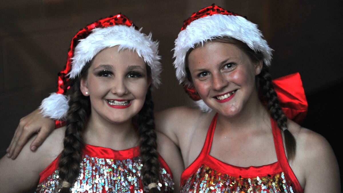 Abbey Rumbachs, 12, and Sarah-Jane Muir, 13, all dressed up for the Wagga Christmas Spectacular. Picture: Addison Hamilton