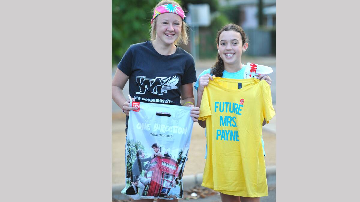  Chloe Chapman, 14 and Chloe Hilton,10 with their new One Direction merchandise. Picture: Addison Hamilton