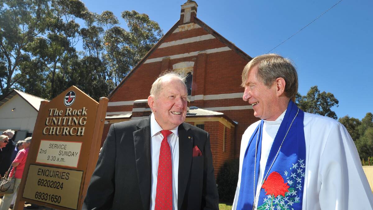 Rob Yates and Rev. Dr. Brian Brown celebrate The Rock Uniting Church's centenary. Picture: Addison Hamilton 