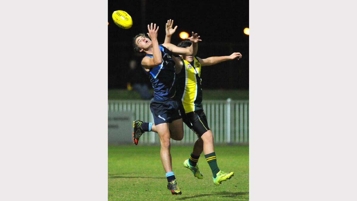 Wagga High School's Harry White spills a mark as Isaac Wichman tries to defend him. Picture: Les Smith