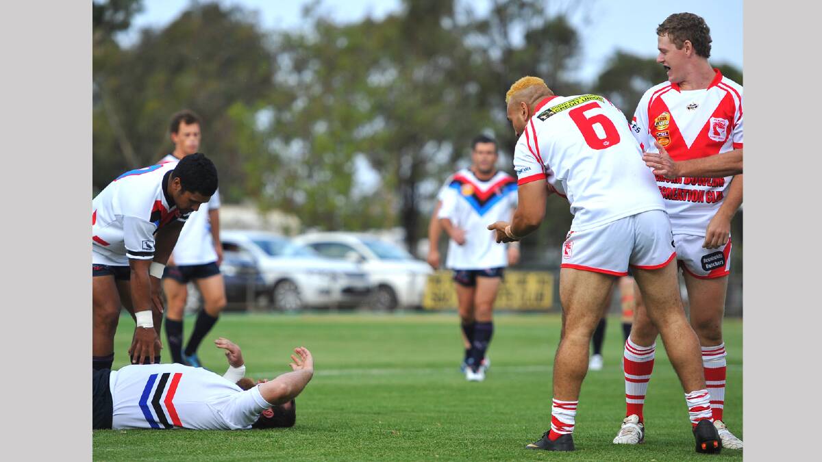 Southcity prop John Makeham lies on the ground after being tackled by Temora's Pee Wee Moke. Picture: Addison Hamilton