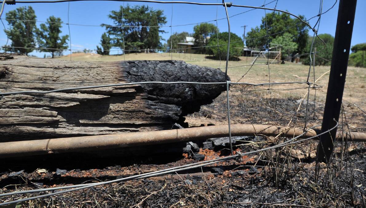 A damaged fenced from the Mates Gully Road fire earlier this month.