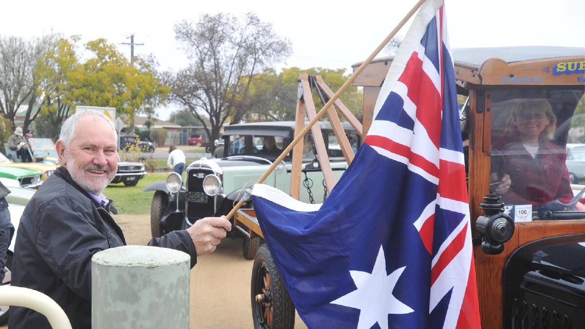 Wagga Veteran Vintage Motor Car rally - Rod Kendall flagging the cars off. Picture: Alastair Brook