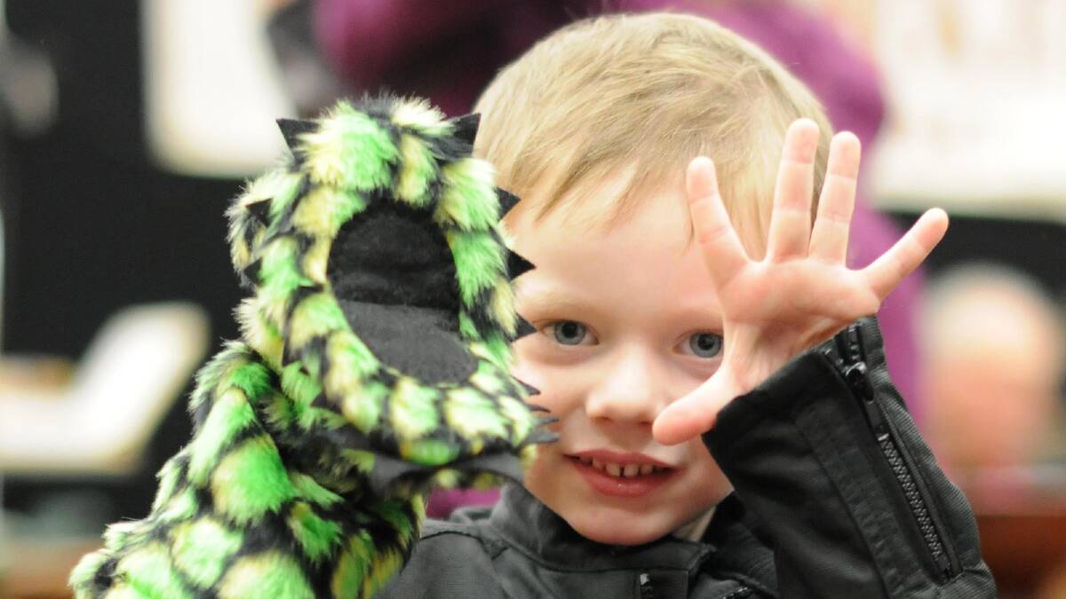Travis Clothier shows off his new hand puppet at Craft Alive. Picture jacinta coyne 