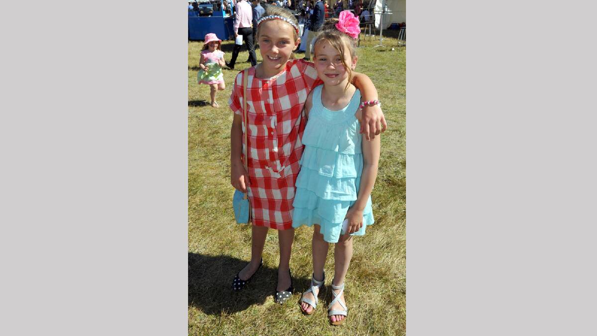 Hermione Cobcroft, 9, and Charlotte Fitzpatrick, 8, having a day out at the Young Picnics. Picture: Les Smith